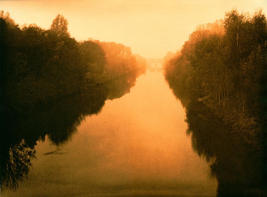 Canal with lock, early morning