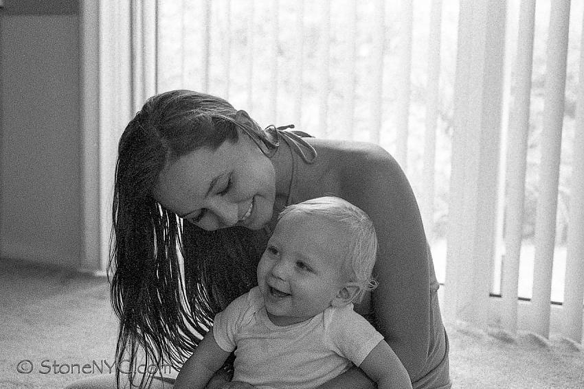 Candid - 6 Months Pregnant laughing with first born