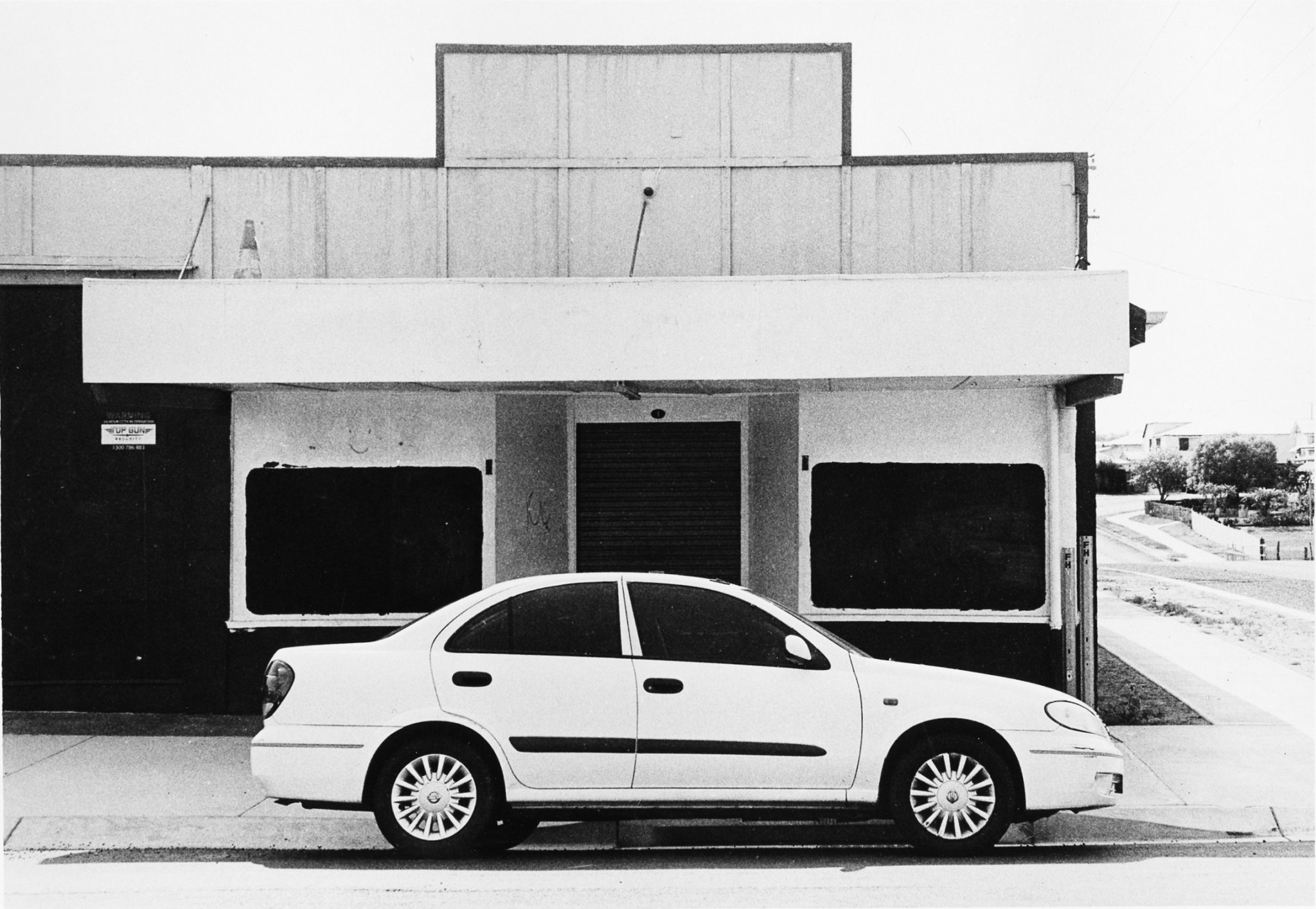 Car in front of Shop