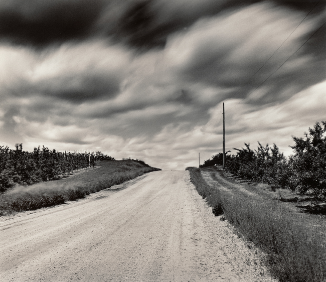 Dirt Road And Clouds