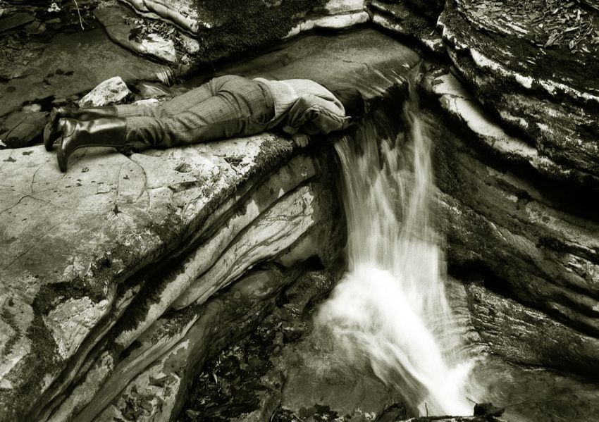Drinking from waterfall