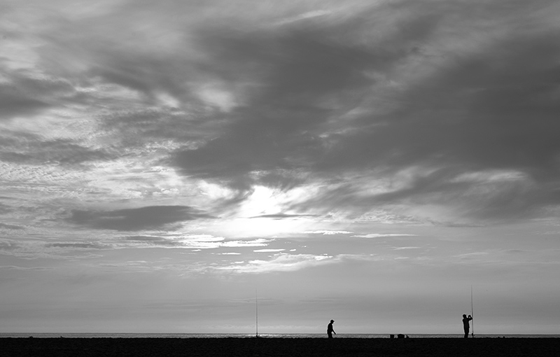 Early morning surf fishers.