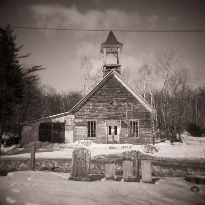 Family lined up outside church building