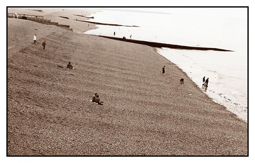 Figures on the beach