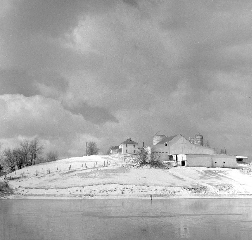 Frozen Lake and Farm House