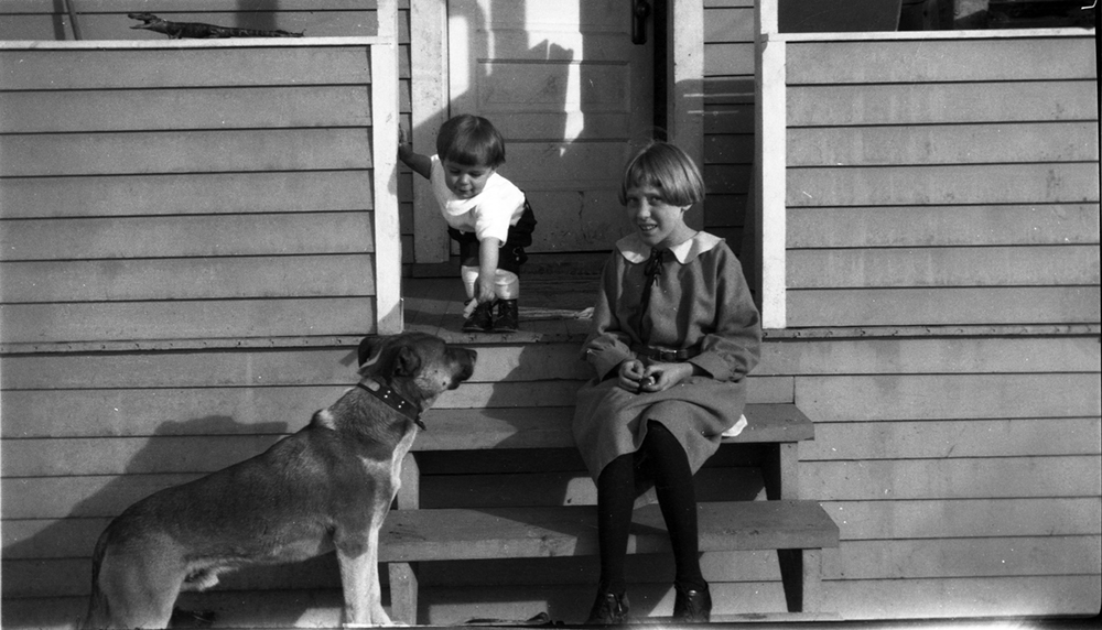 Girl and dog, 1920's.jpg