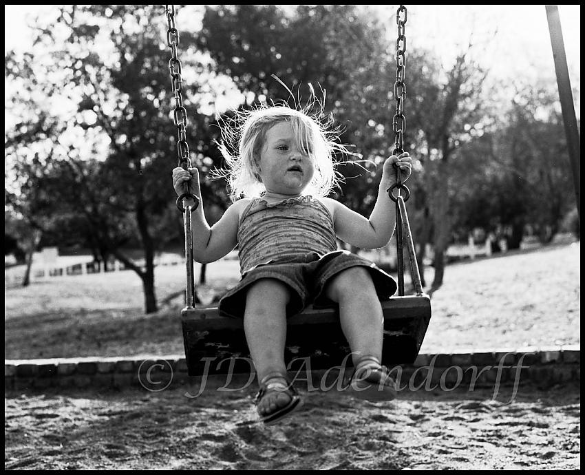 Girl in a swing