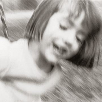 Girl On Swing