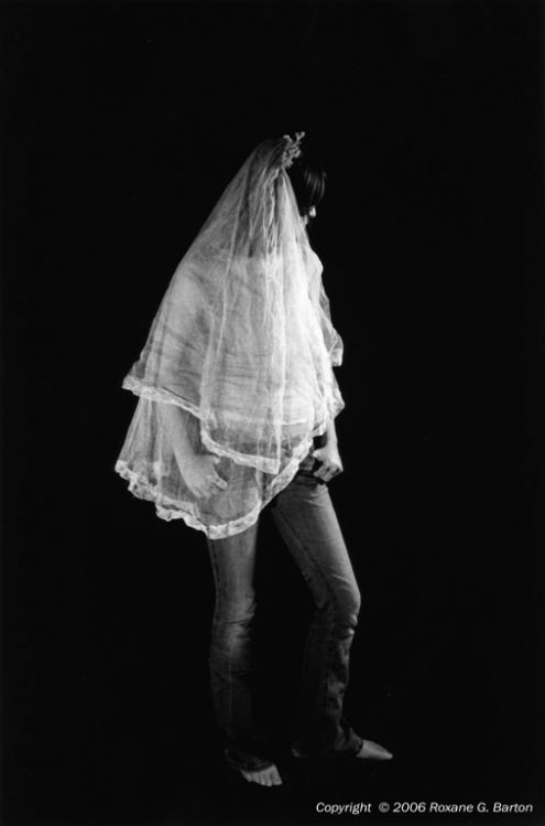 girl with veil standing