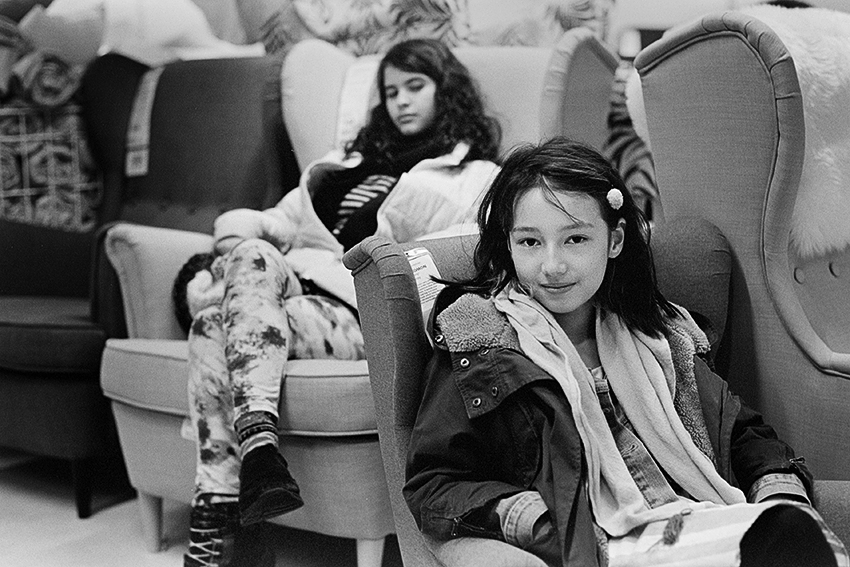 Girls Shopping for a Chair