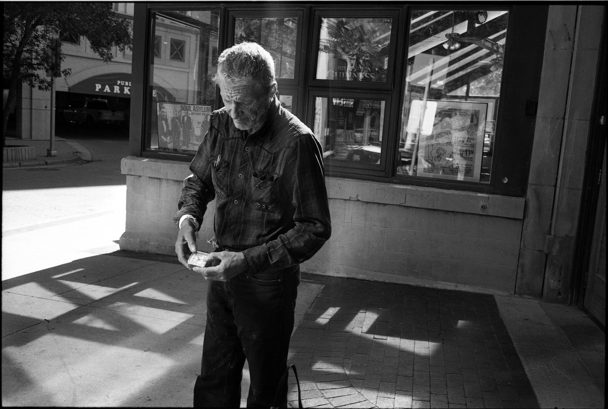 Glen checks the time