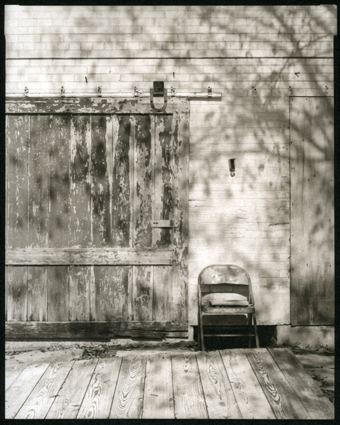 Gonzales, Tx - Chair And Wall
