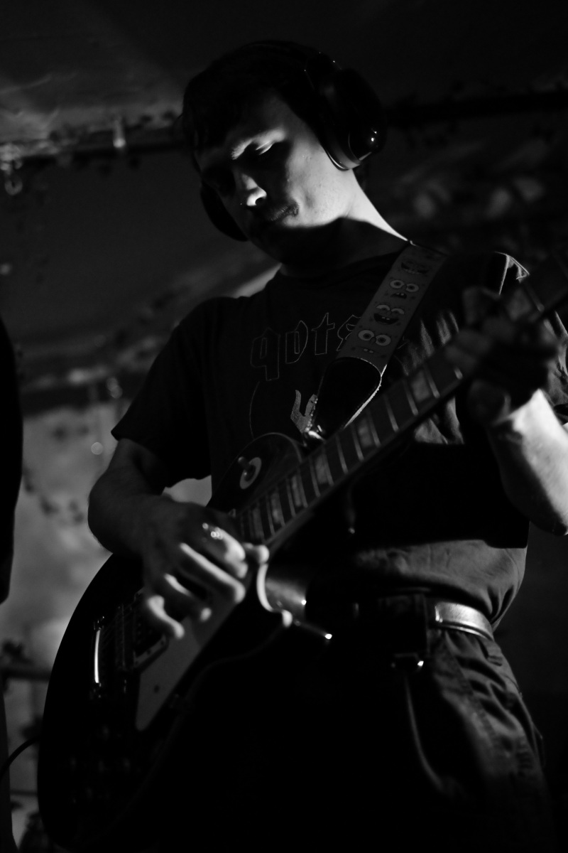 Guitarist at basement show