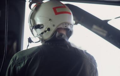 Hanging out the side of a Huey