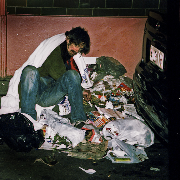 Homelessman in gutter