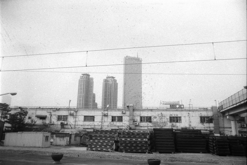 Industrial building shot from train car