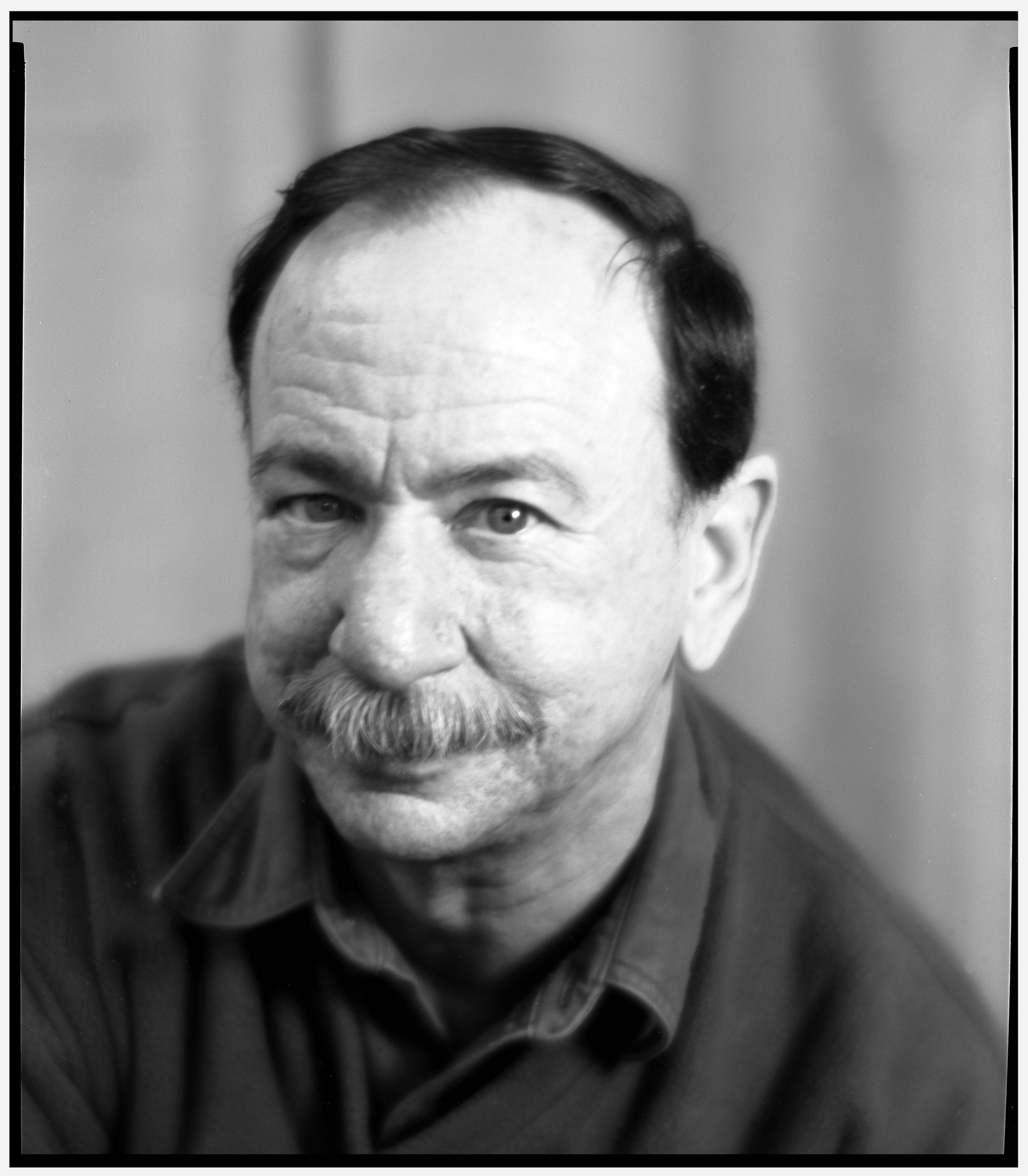 John E.