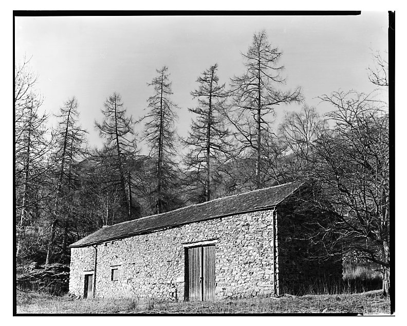 Lake side barn at sunrise