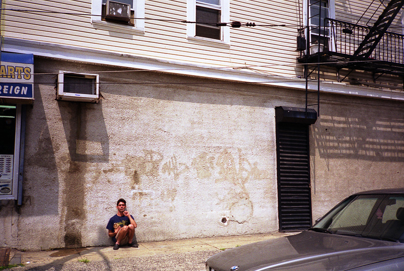 man against wall
