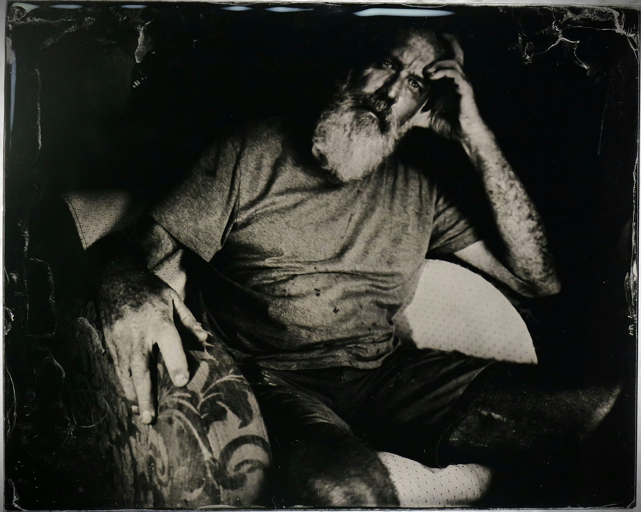 Man in chair.
