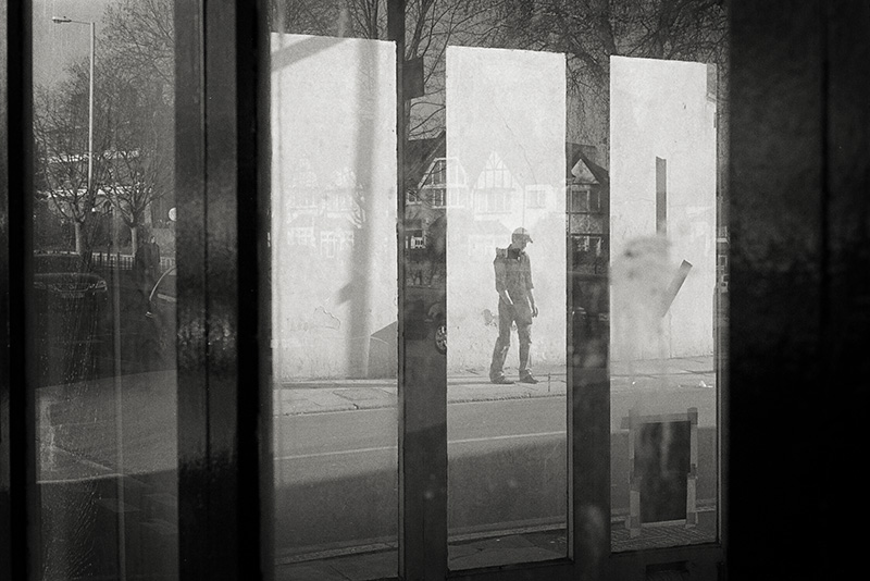 Man through glass