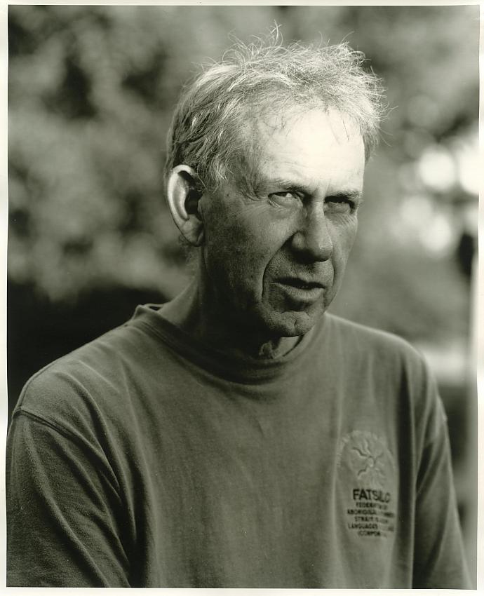 Man with light on his head.