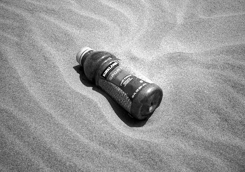 Message in a bottle. Recycle Me!