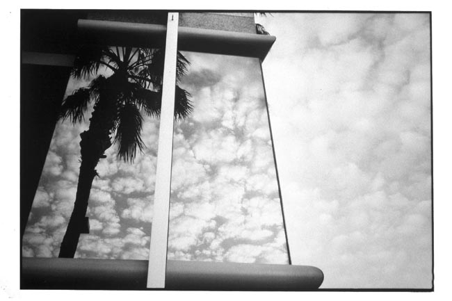 Mirrored Bldg w/Clouds, Reflections