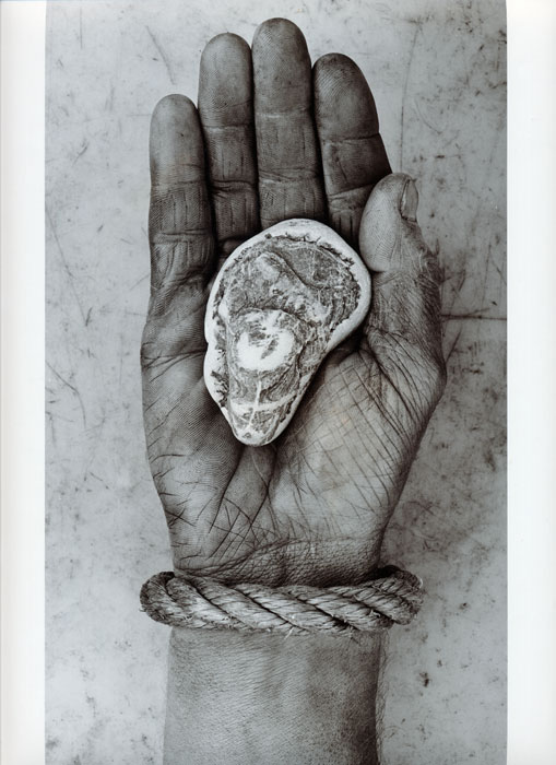 My hand, with stone