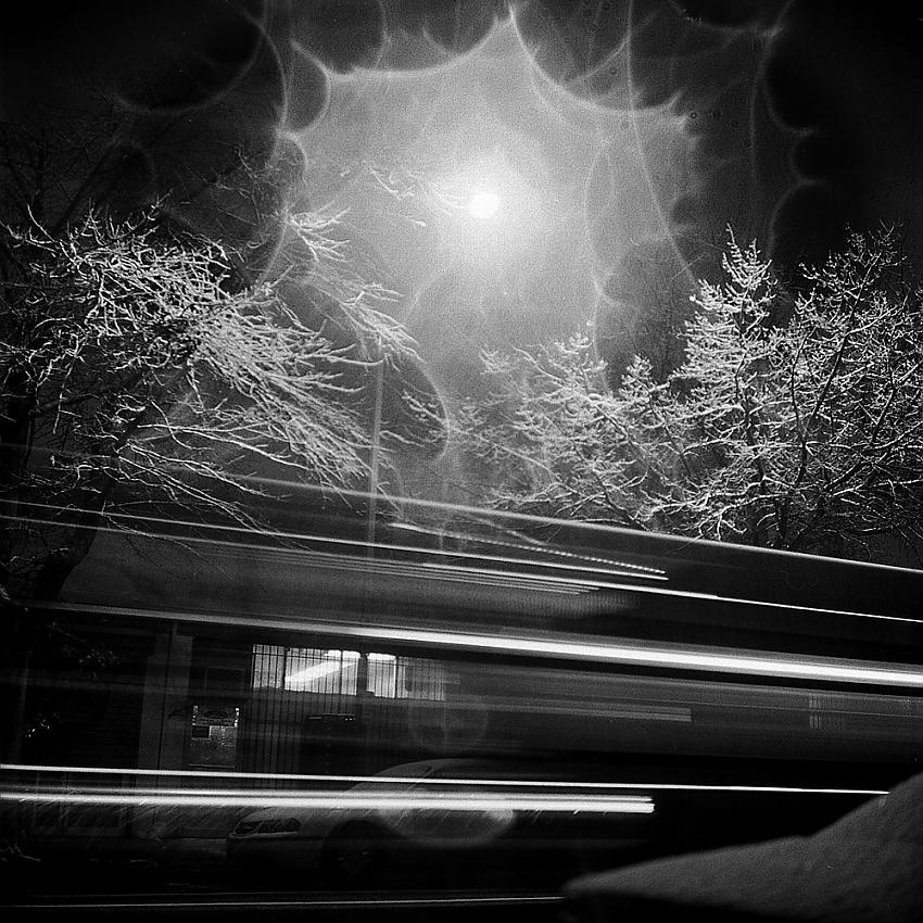 Passing City Bus, 11th Street, Snowstorm