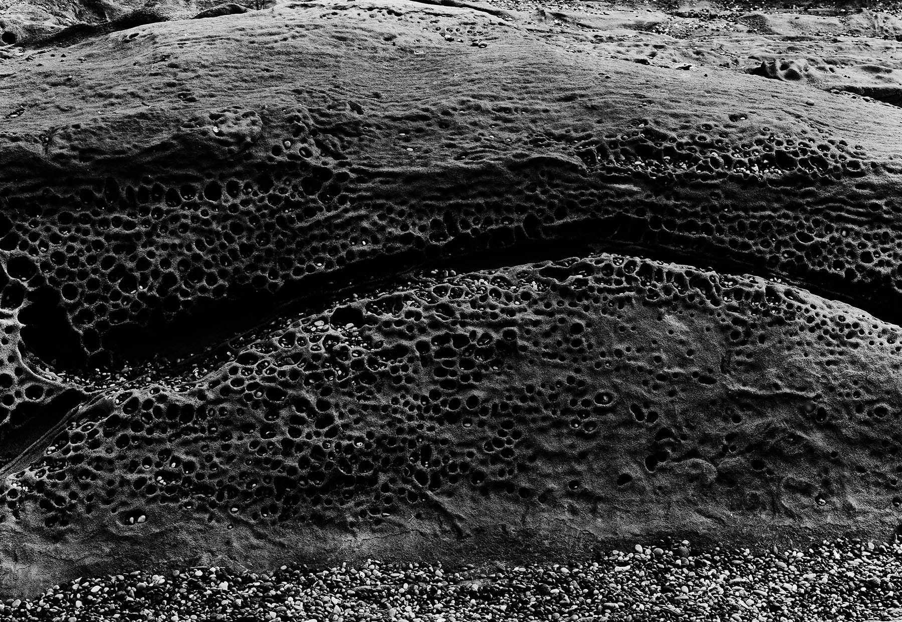 Pebbles In Rock Formation