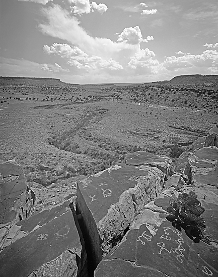 Petroglyph and Clouds