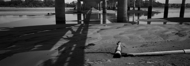 Pipes Under Bridge