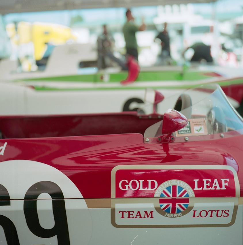 race car and people