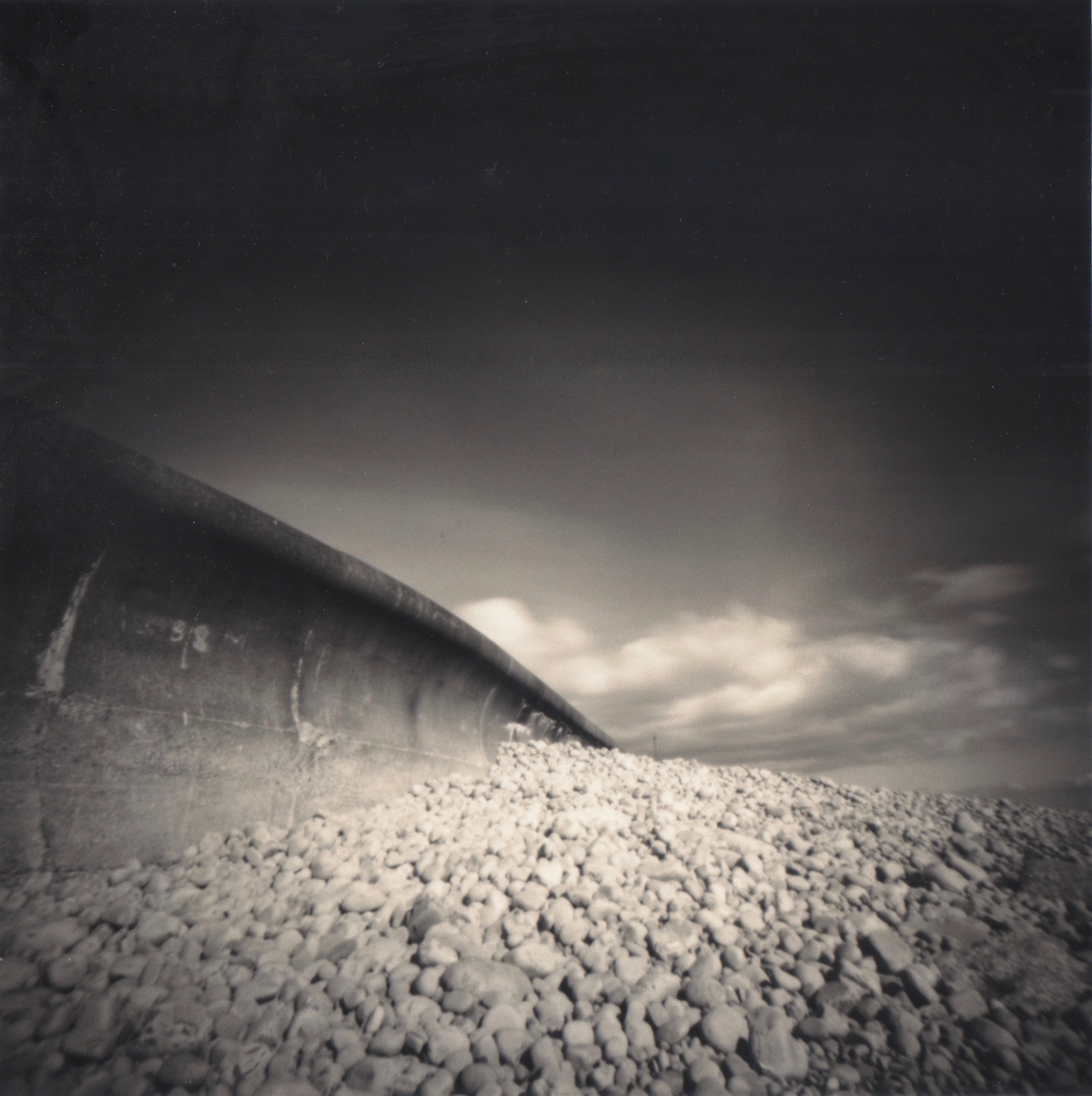 Sea wall and passing clouds