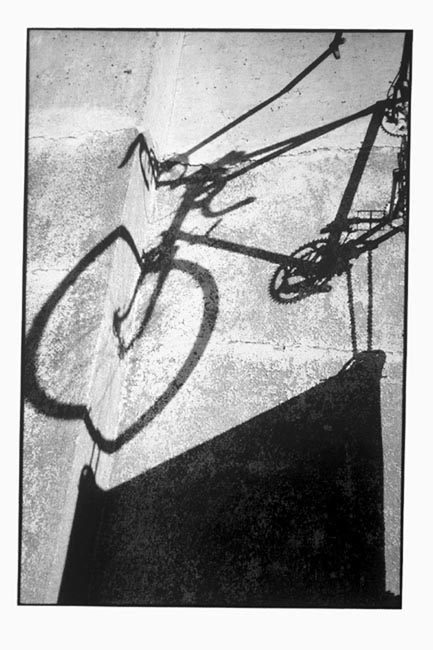 Shadow of Bike Sign
