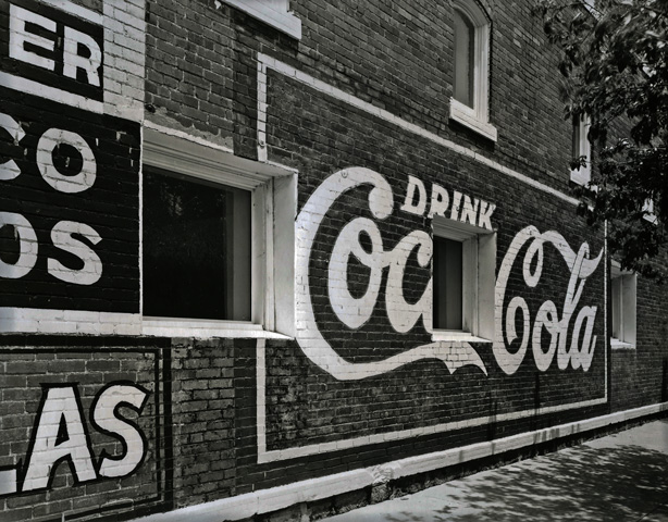 Sign, Cola, Pioneer Hardware Building