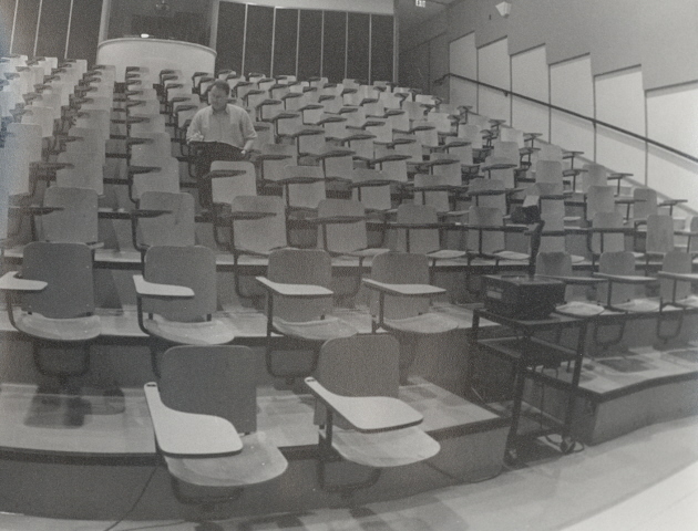 Sitting in an empty lecture theatre