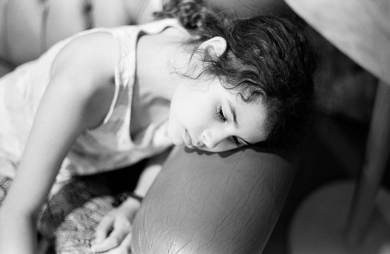 Sleeping (while her sister shops)