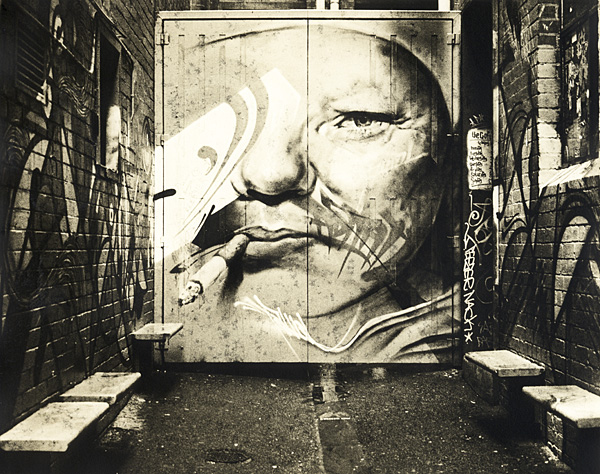 Smoking Man in Alley