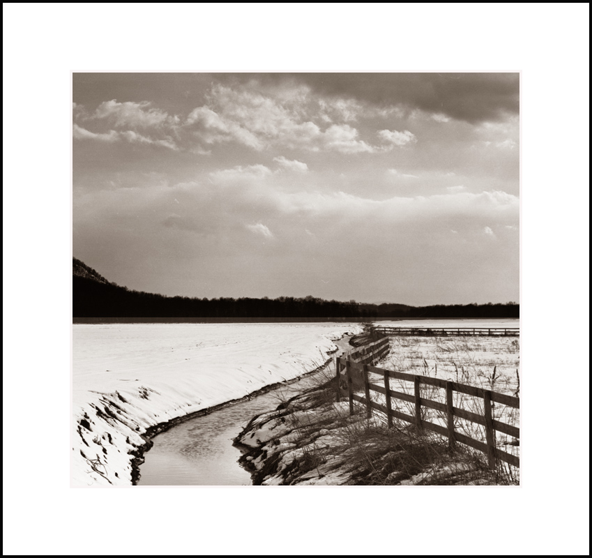 Snowfield, Fence and Sky