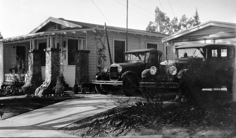 Suburban house and cars, 1920's.jpg