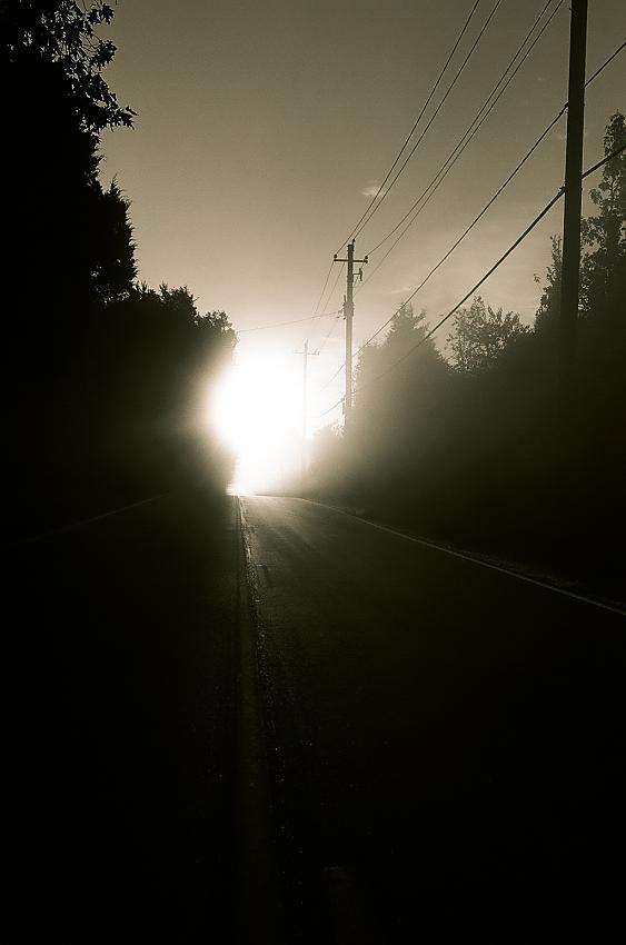 Sun rise over the road home II