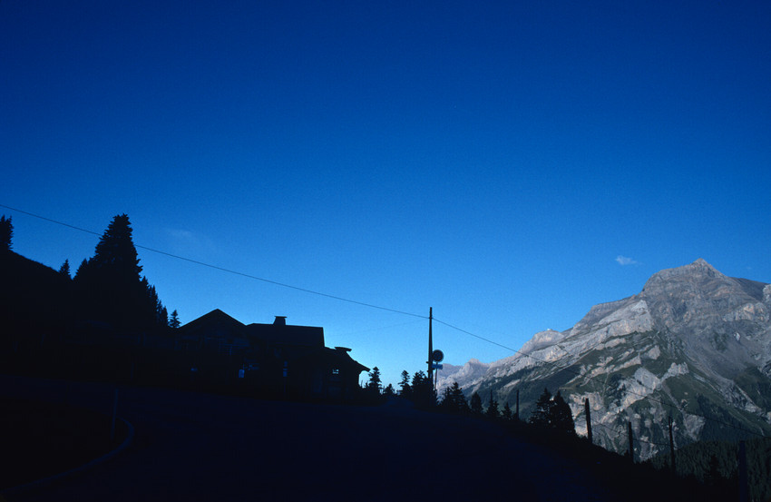 Swiss alpine road in silhouette