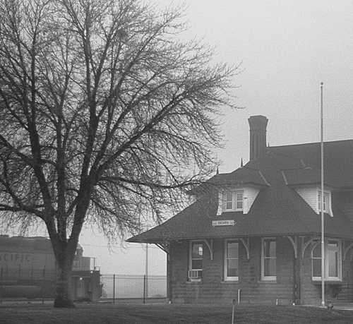 Train station on a foggy evening