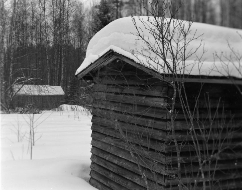 two sheds and snow