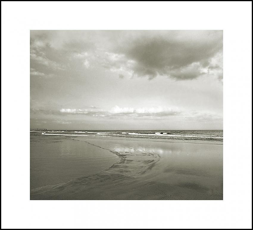Wet Sand, Clouds, and Ocean