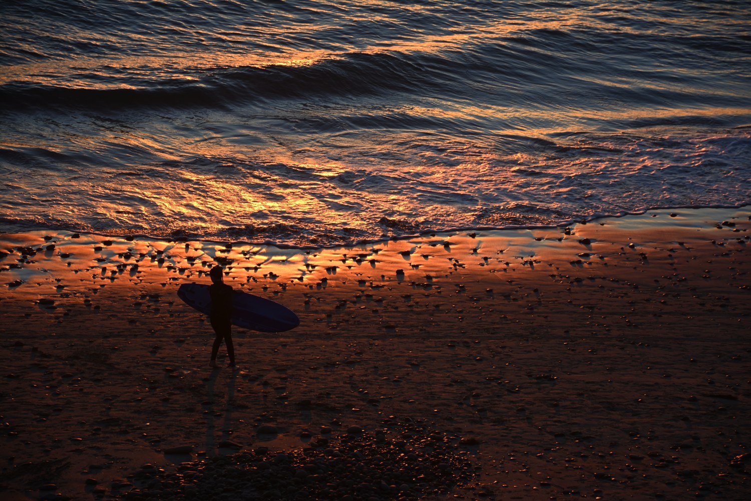 20160209surferonbeachsmalltoshare.jpg